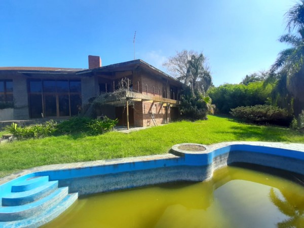 CASA EN VENTA  CON SALIDA AL RIO